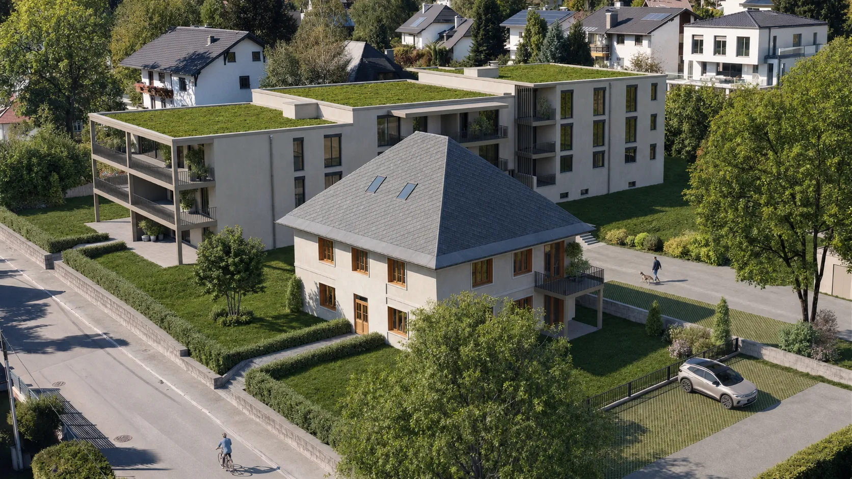 Luftansicht des AURA Ensembles mit Neubau, Bestandsvilla und begrünten Dächern – Symbolbild, mit KI bearbeitet